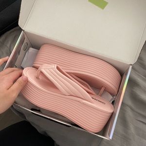 pink platformed sandals!